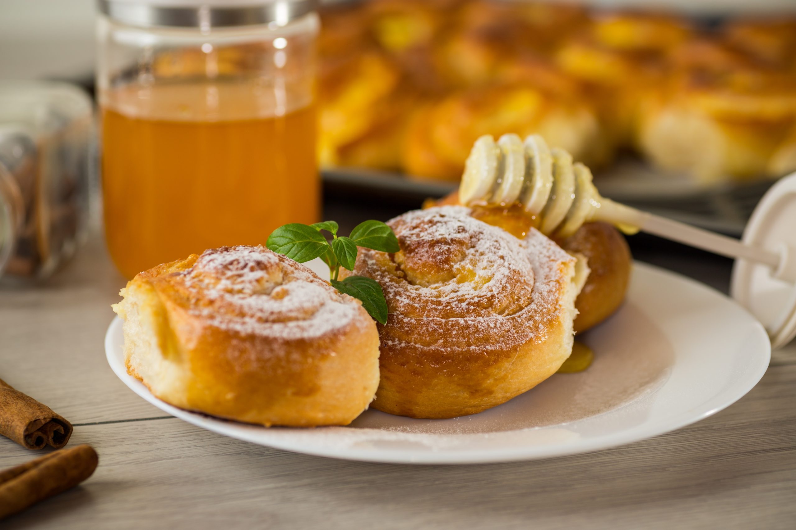 Pastries.,Sweet,Buns,With,Cottage,Cheese,Filling,And,Honey,In