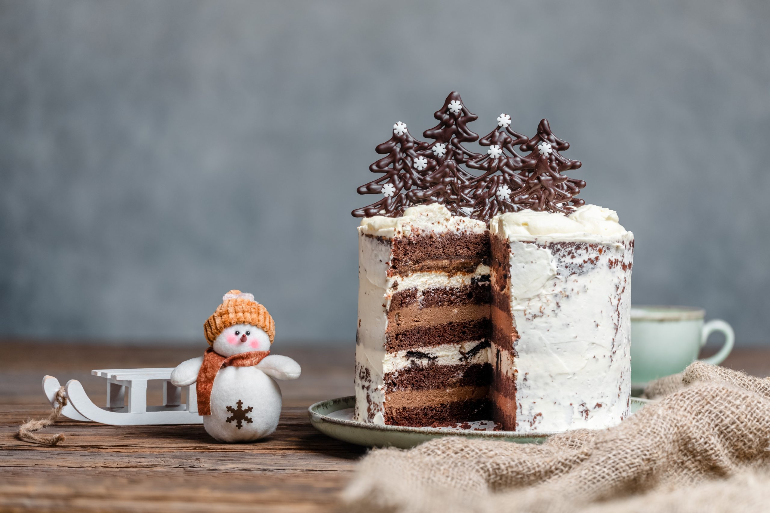 Homemade,Christmas,Cake,With,Chocolate,Christmas,Trees,On,A,Wooden